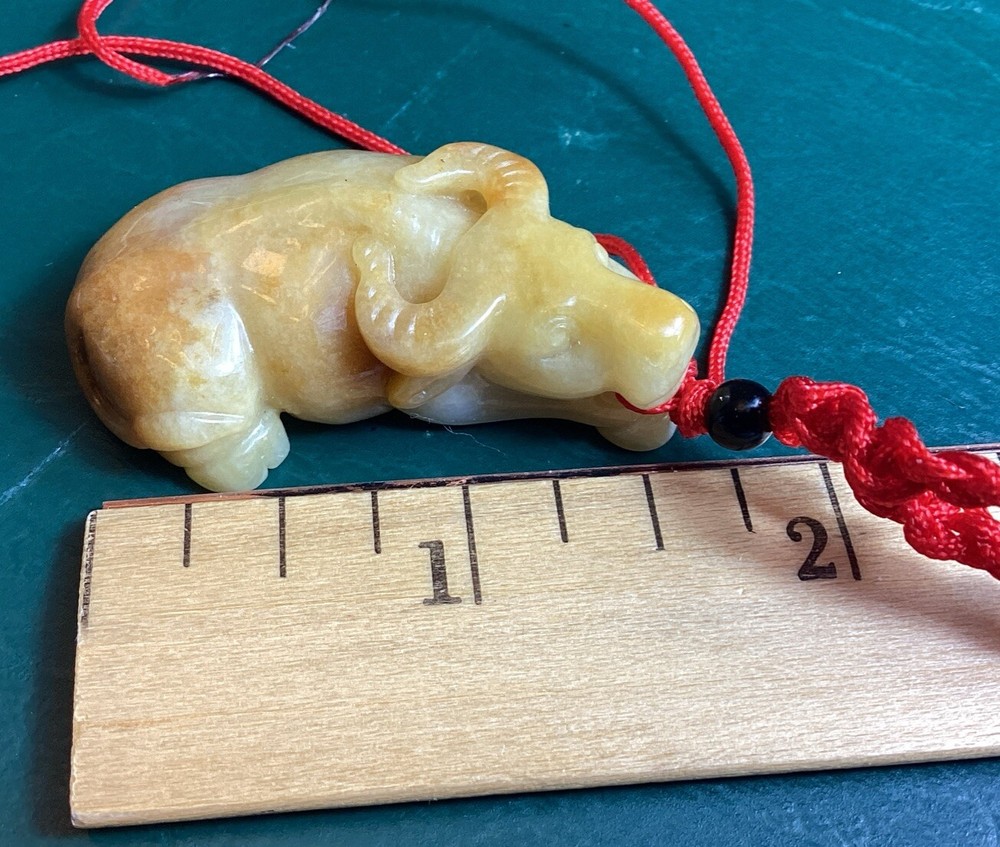 Brown 2 Sided Jadeite Ox Translucent Pendant