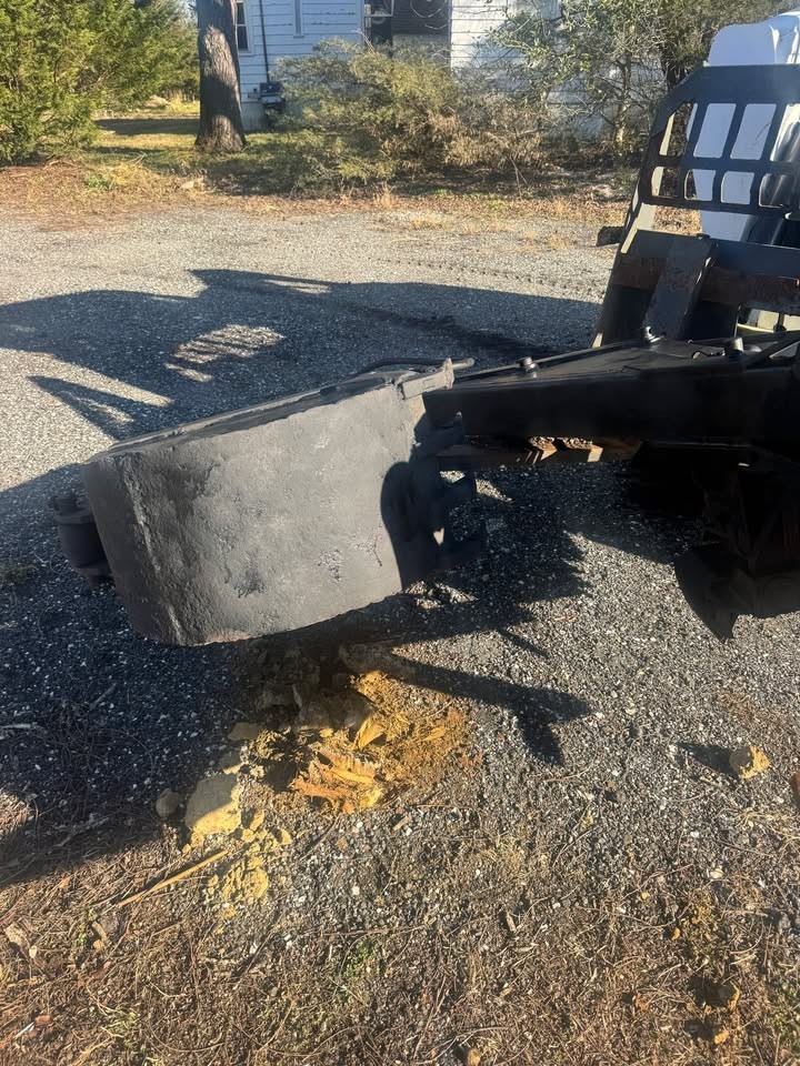 Heavy-duty white backhoe-used good shape