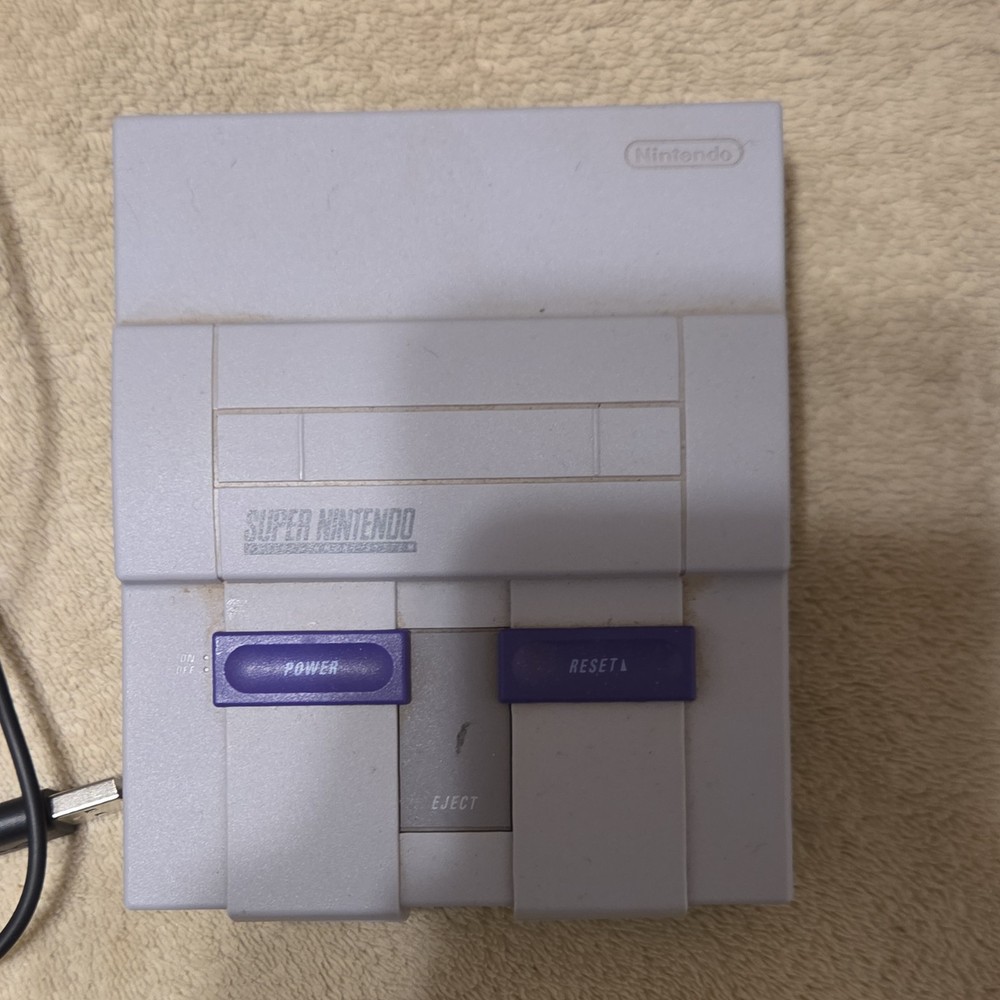 Nintendo SNES classic with controller and cables
