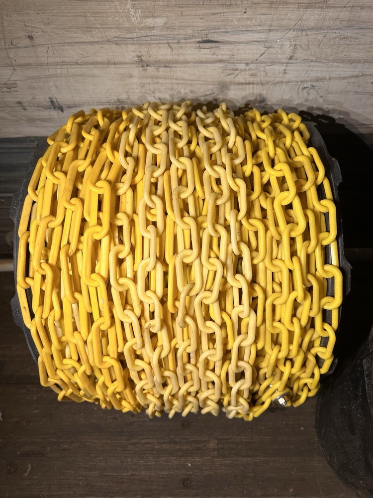 Yellow Plastic Chain For Crowd Control Approximately 500’ On Roll