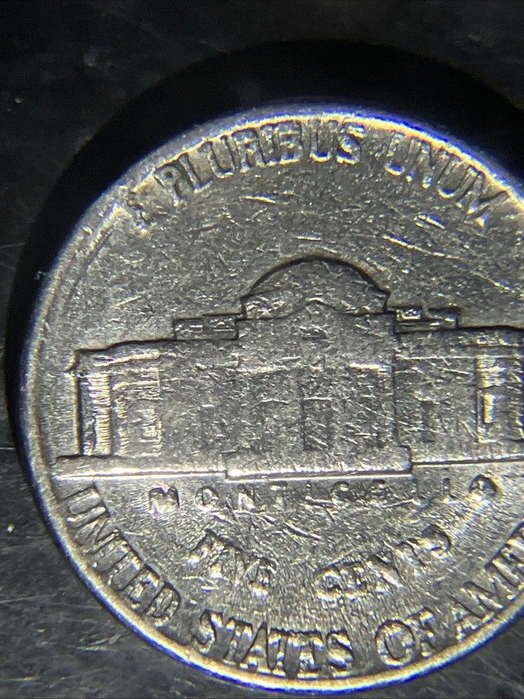 1980 D Nickle Struck Through Grease