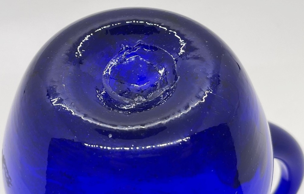 Early deep blue blown swirl ribbed pitcher