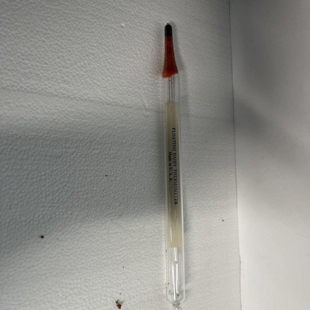 vintage floating dairy thermometer