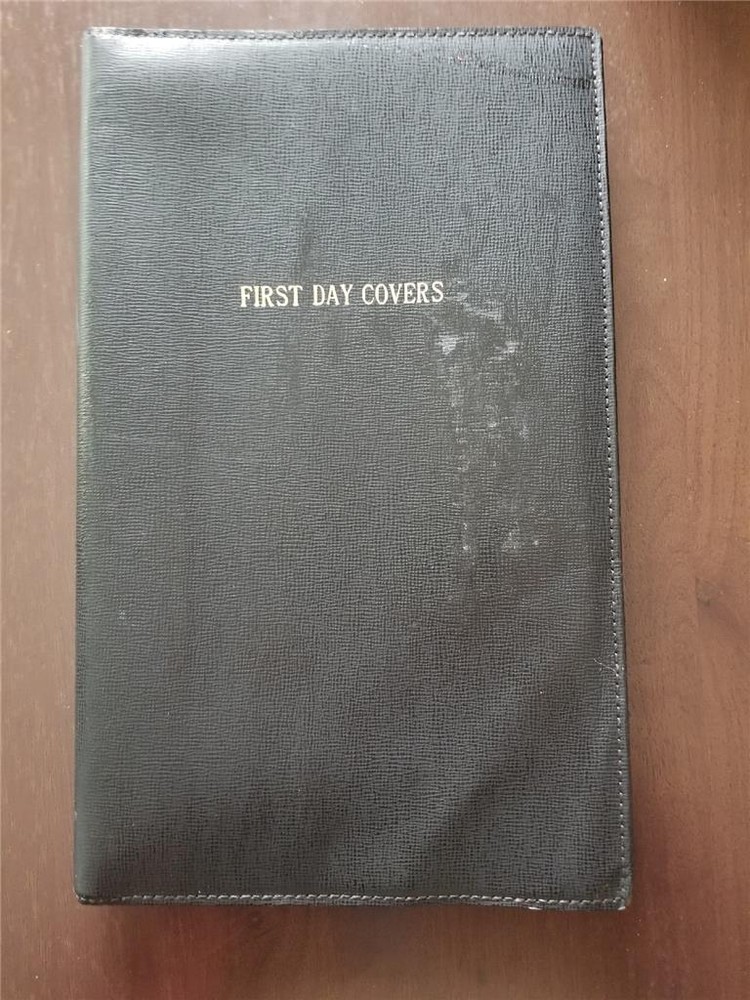 Vintage Gimbels first day cover album in black leatherette, 50 sheets