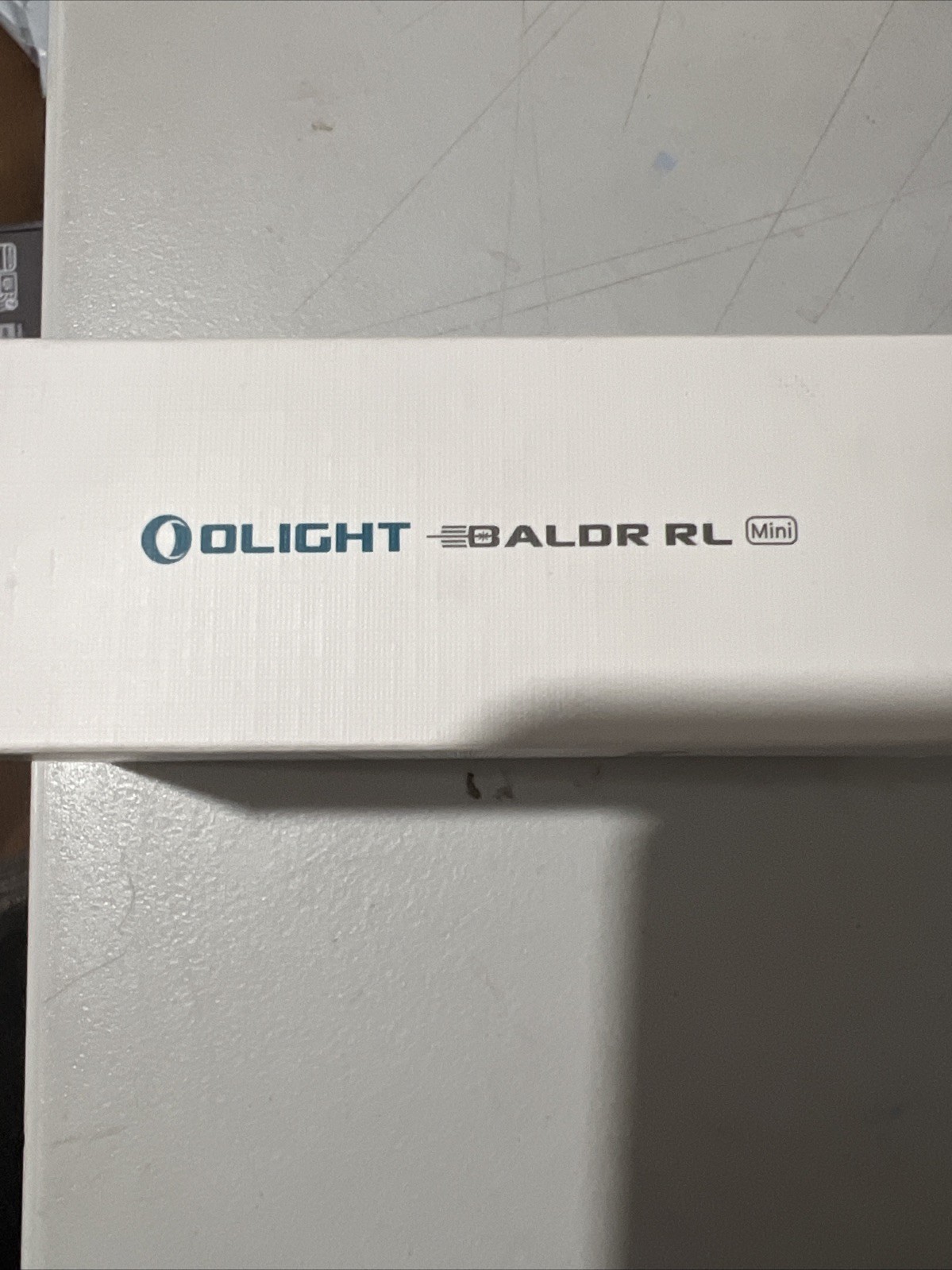 Olight Baldr RL Mini 600 Lumen Tactical Light - Black - Red Beam Laser