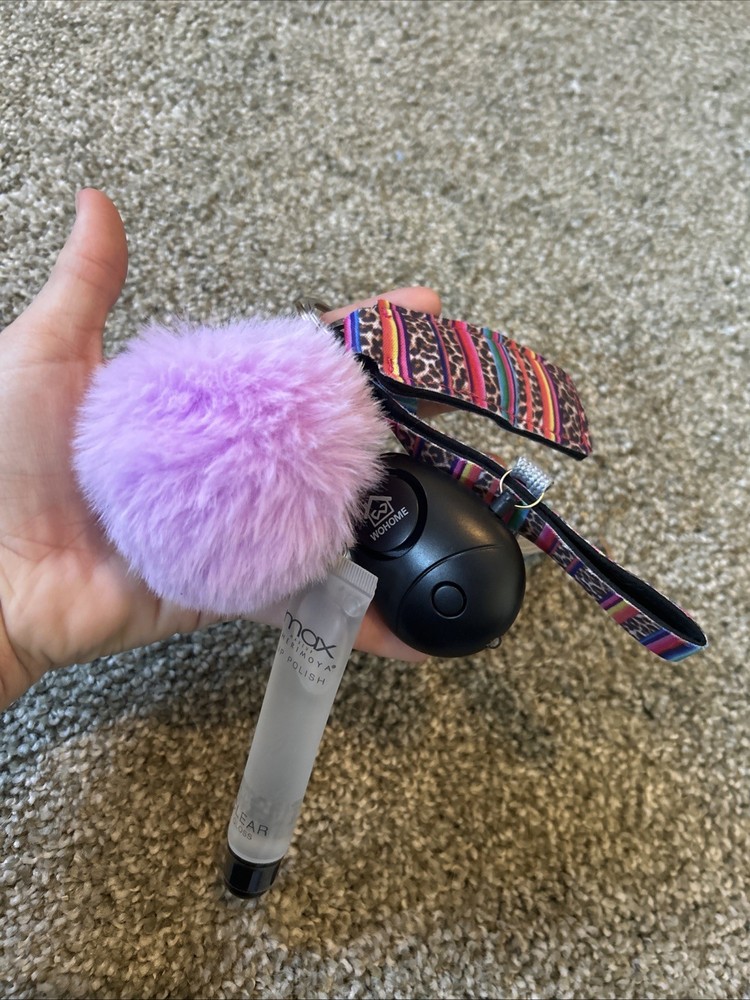 Personal Safety Keychain Set with Several Attached Accessories.