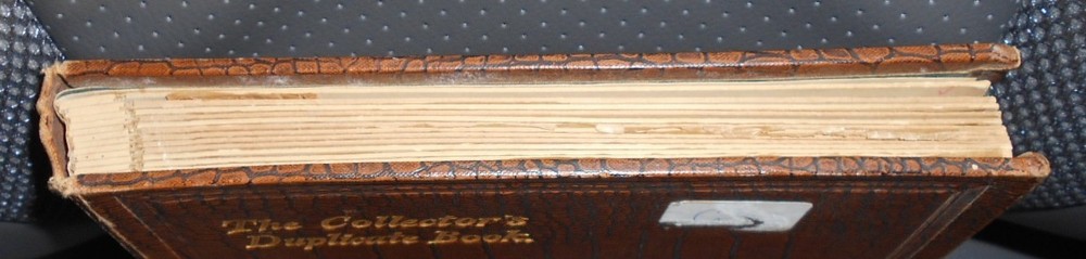 Brown stockbook; 12 /2 pages each with 11 pockets [total 264 pockets]