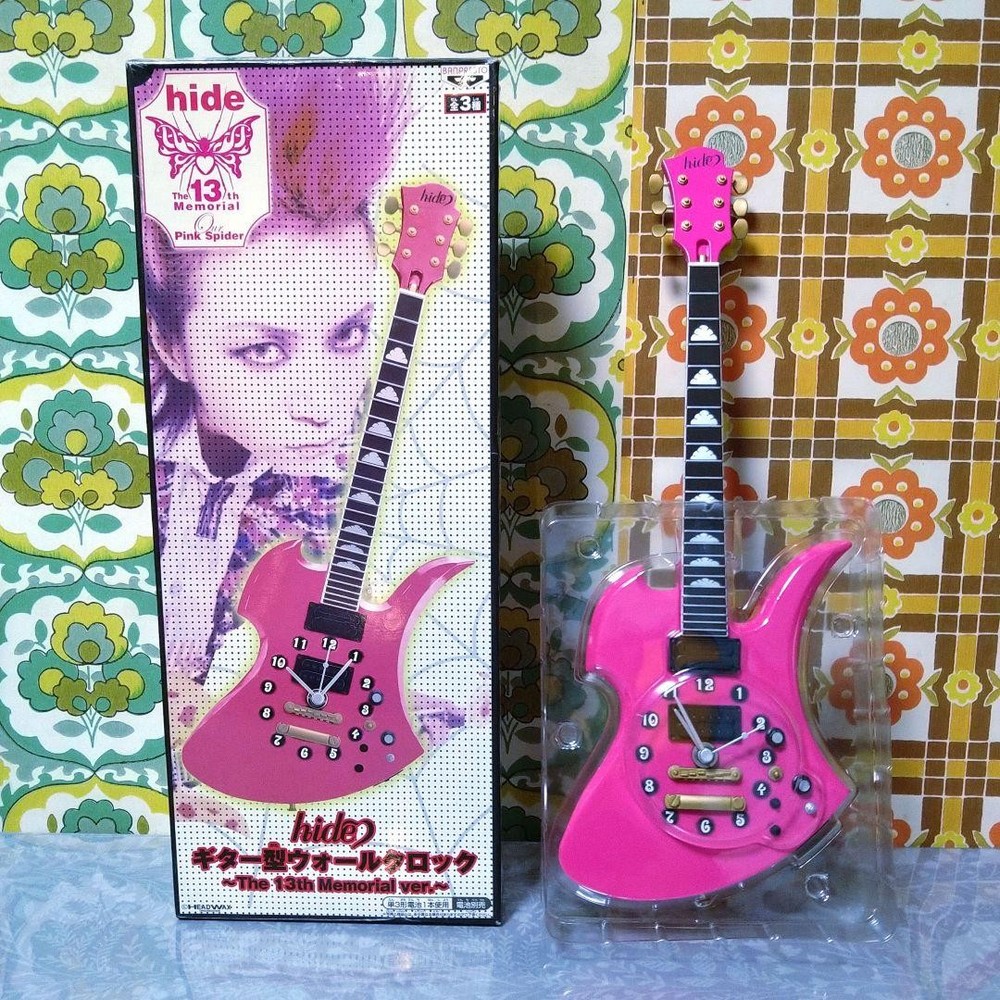 hide guitar wall clock pink
