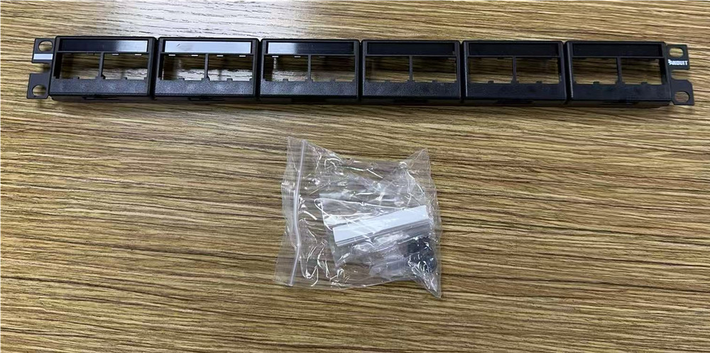 Panduit Mini-Com Flat Modular Patch Panel w 24 Ports & Front Access, CPPL24WBLY