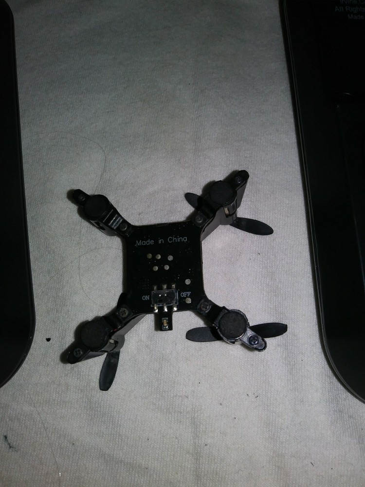 2 Sharper Image DX-1 Remotes Controllers Plus Micro Drone For Parts Not Tested