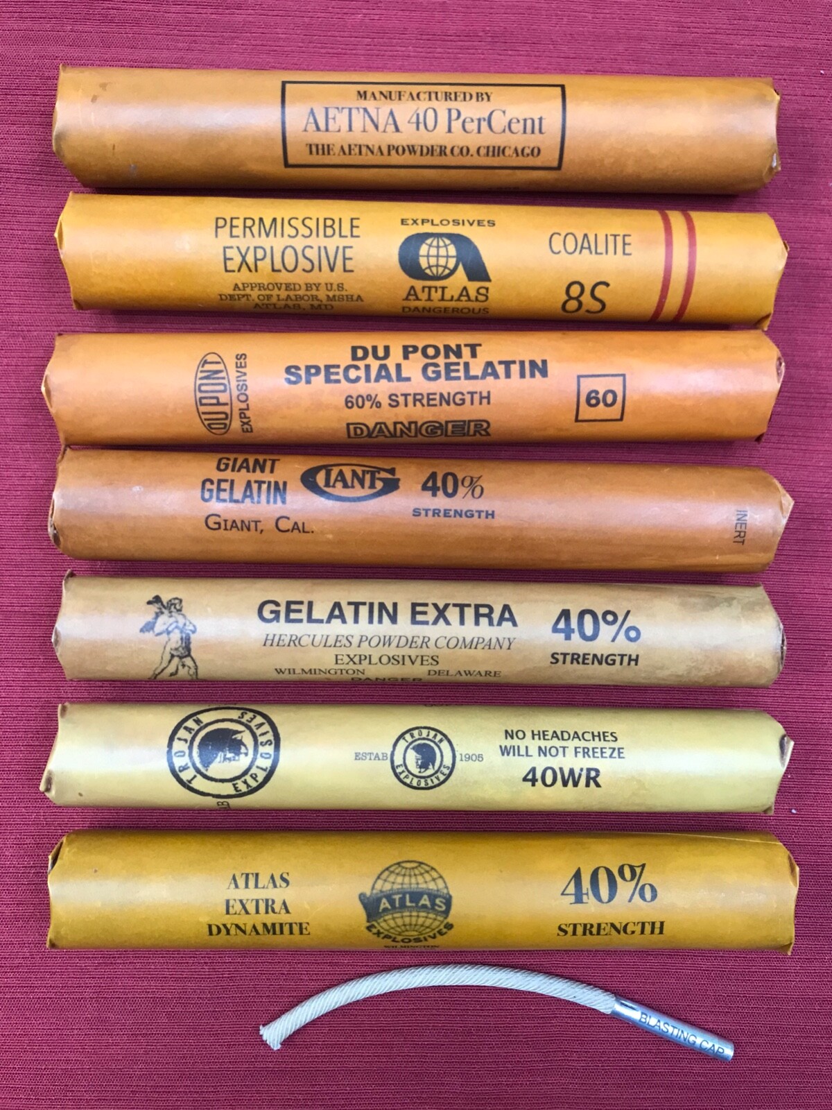 inert dynamite sticks with cap and fuse, set of 7. Great for display, movie prop