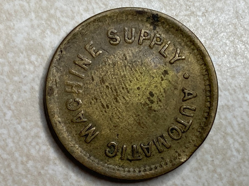 The Automatic Machine Supply Co Brighton UK E Mann Vending Trade Token T2152