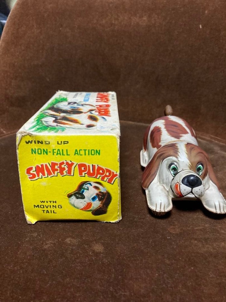Tin wind-up toy dog