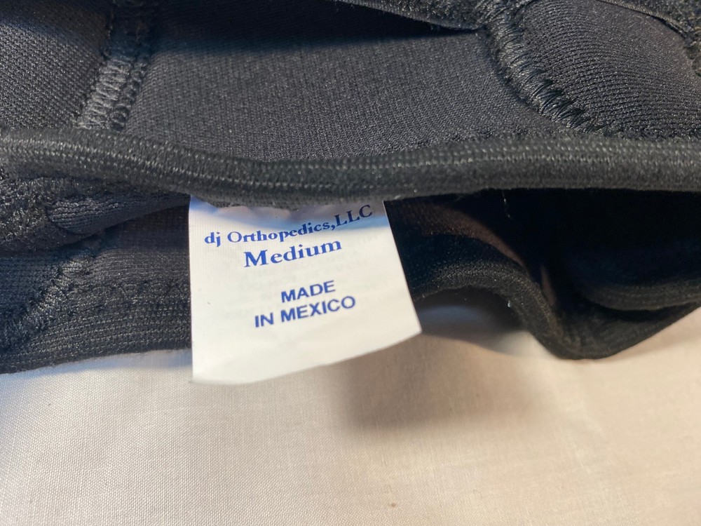 DonJoy Knee Brace Adjustable with Hinged Metal Support - Medium