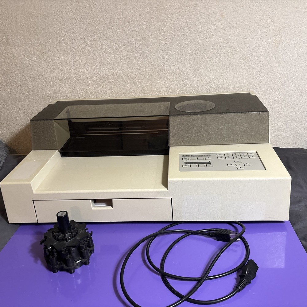 Hewlett-Packard vintage HP 7550 Plus Plotter with carousel and cord.