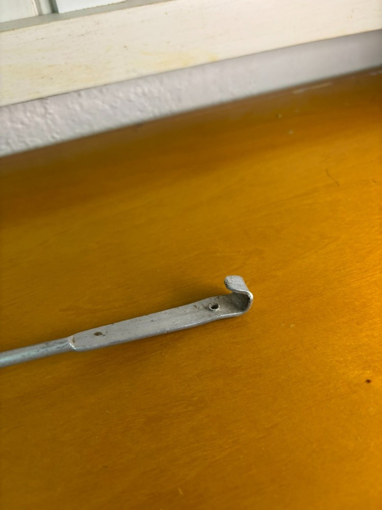 small vintage aluminum strainer