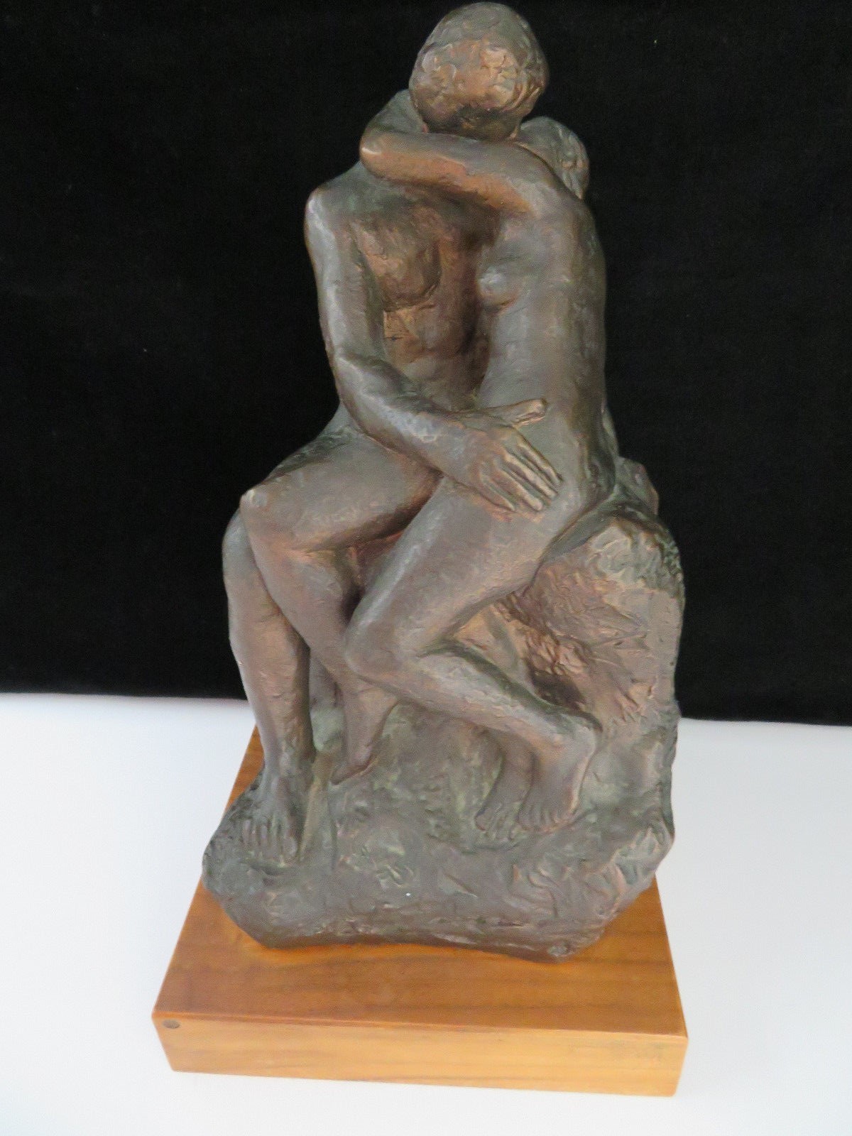 The Kiss Molded Statue on Wood Base