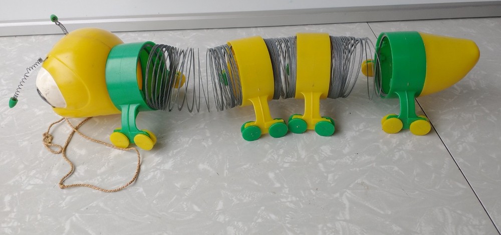 Vintage Slinky Cater-Puller Pull Toy Yellow Head Stretched Incomplete