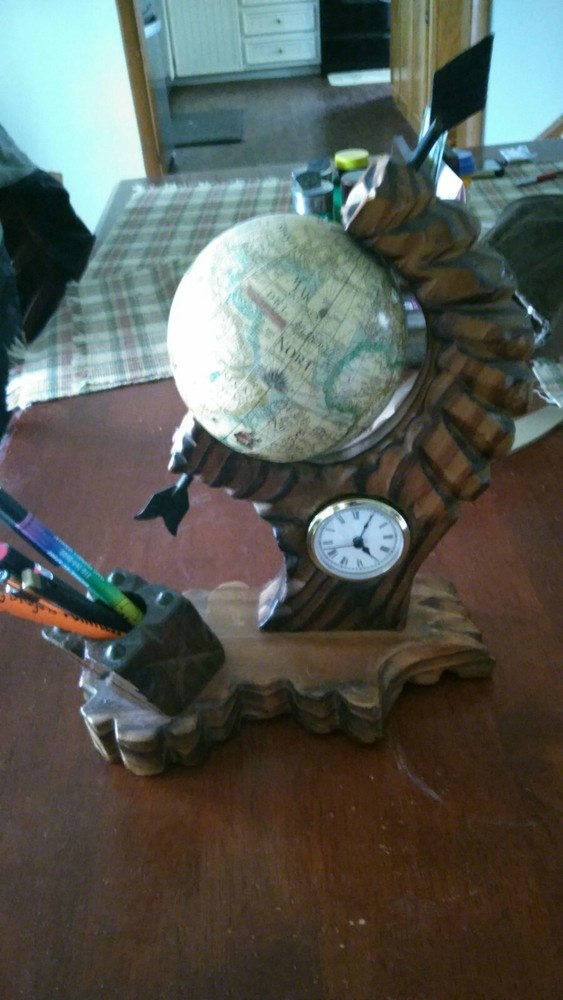 A Very Ornate Desktop Globe With Quartz Clock