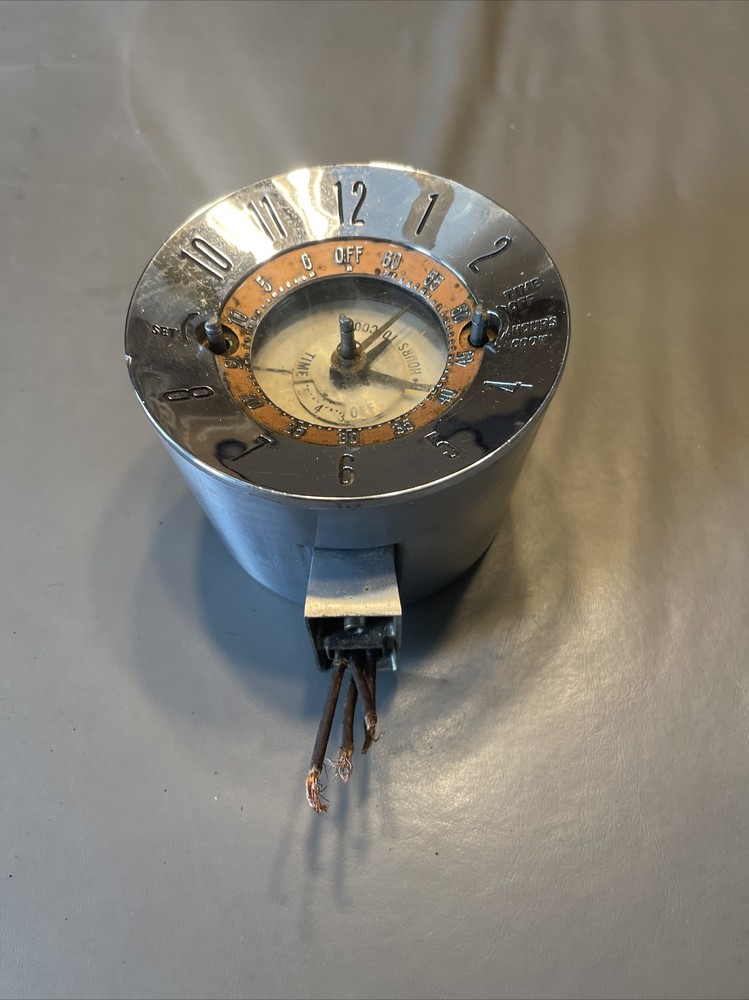 VINTAGE CHROME RETRO CLOCK MID CENTURY ELECTRIC CLOCK EMBOSSED BOLD TIMER