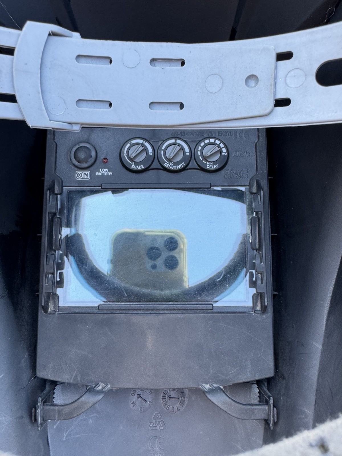 Miller Elite Welding Helmet with manual and extra lenses, new batteries