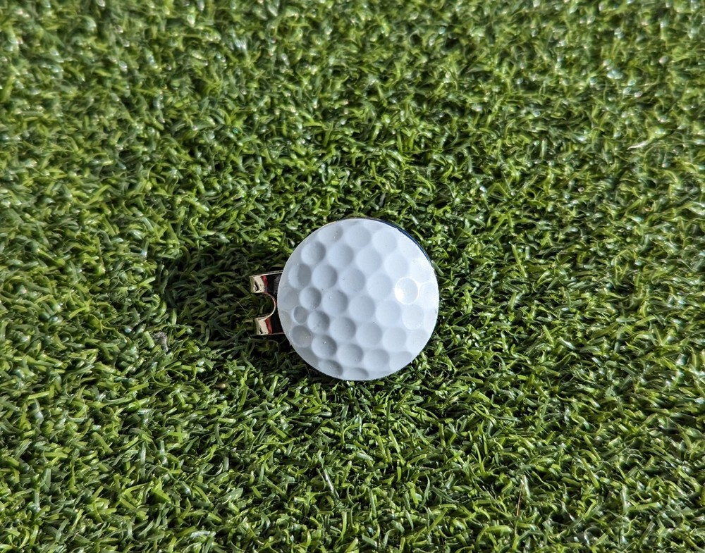 Real golf ball marker with magnetic hat clip