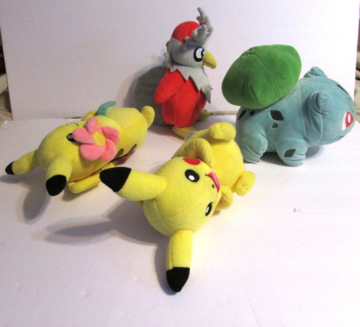Lot Of 4 Pokemon Plush Pikachu W/Flower Delibird Bulbasaur