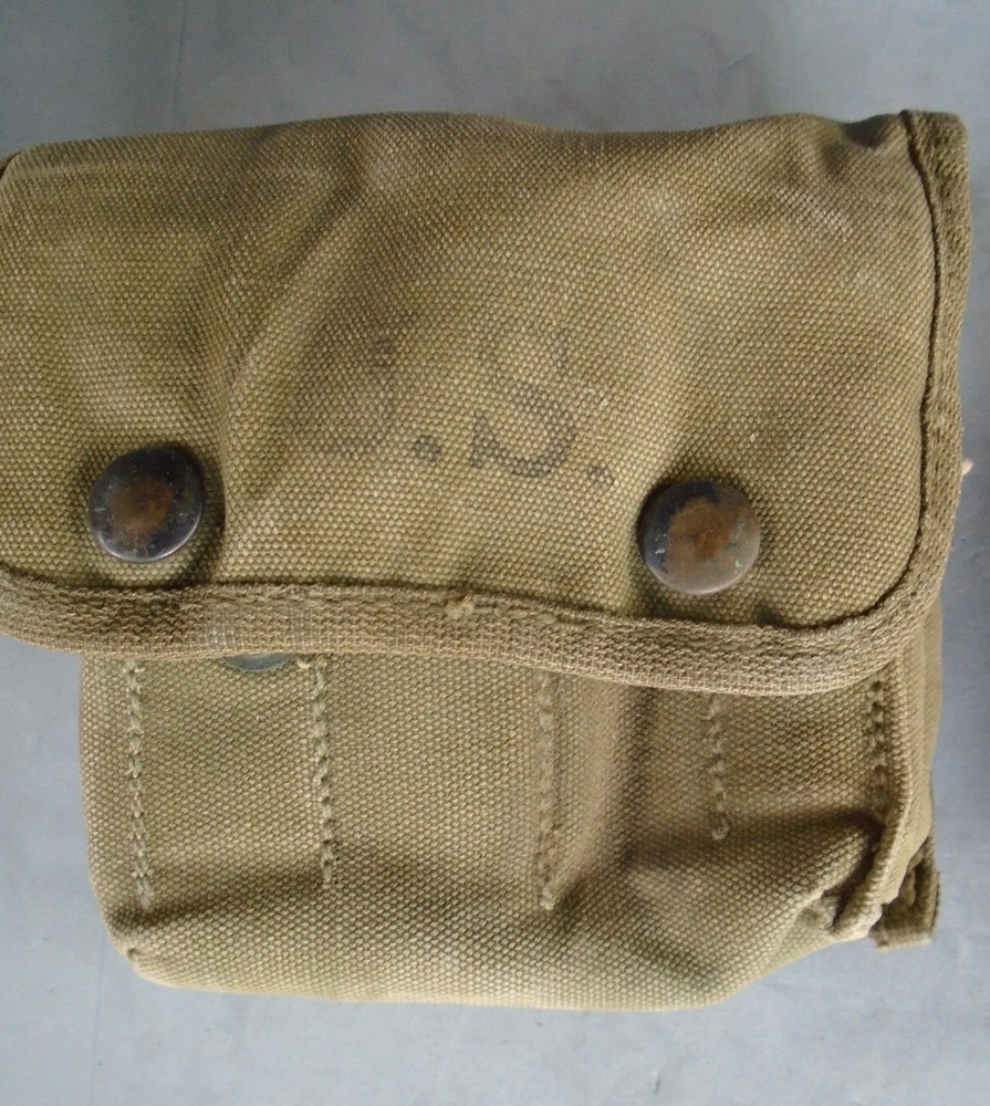 US 1944 Jungle first aid pouch with later issued contents