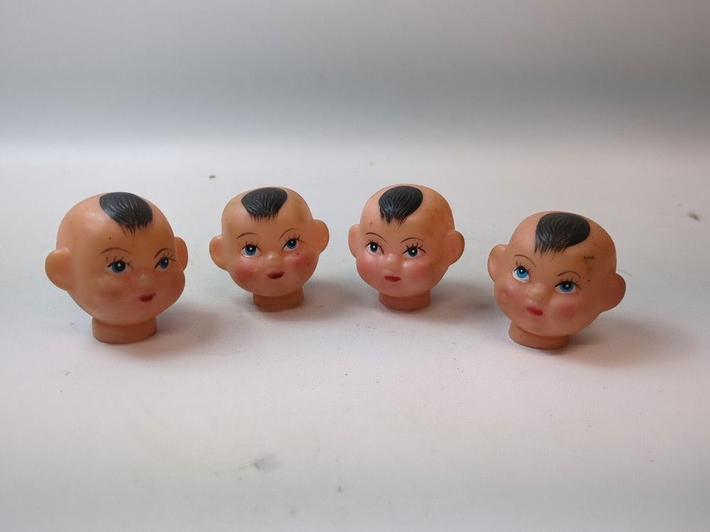 Set of 4 Vintage Rubber Doll Heads