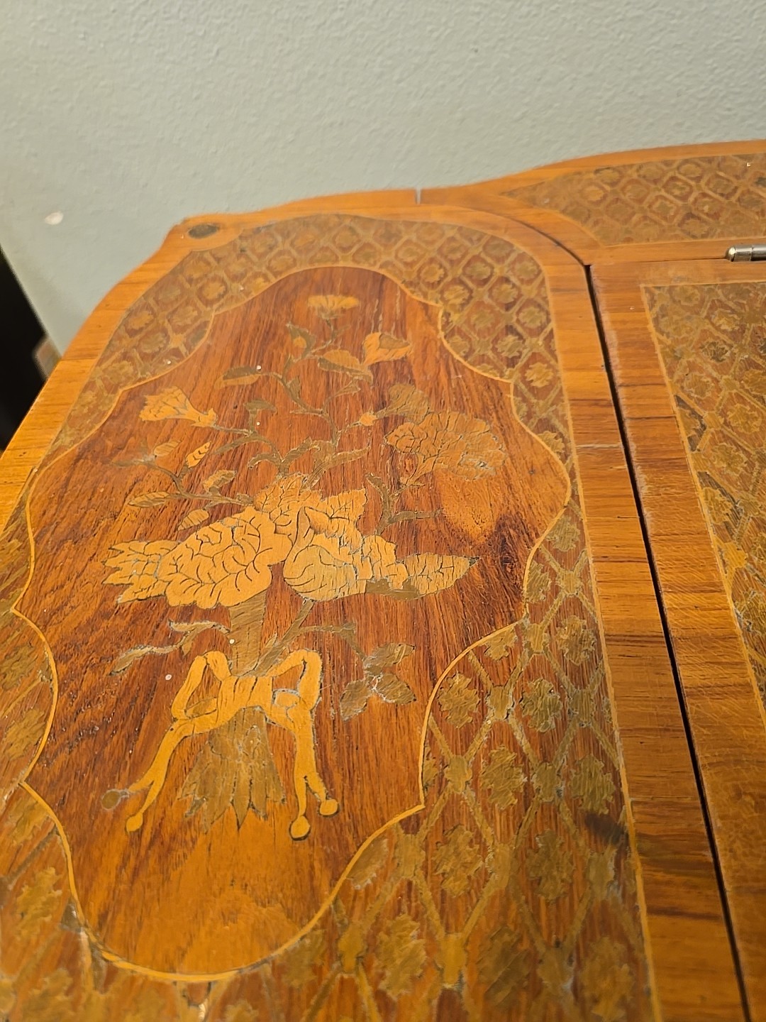 "Antique vanity table from the late 1800s with intricate inlay & a hidden mirror