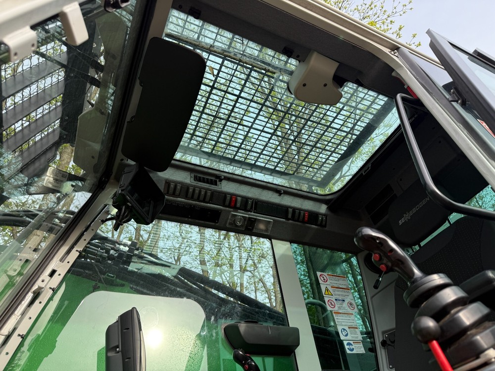 2023 Sennebogen 728e wheeled tree care material handler