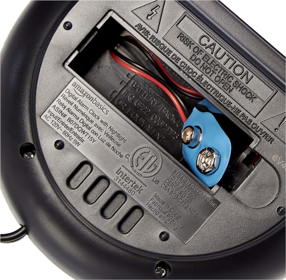 Amazon Basics Small Digital Oval Alarm Clock with LED Display, Nightlight