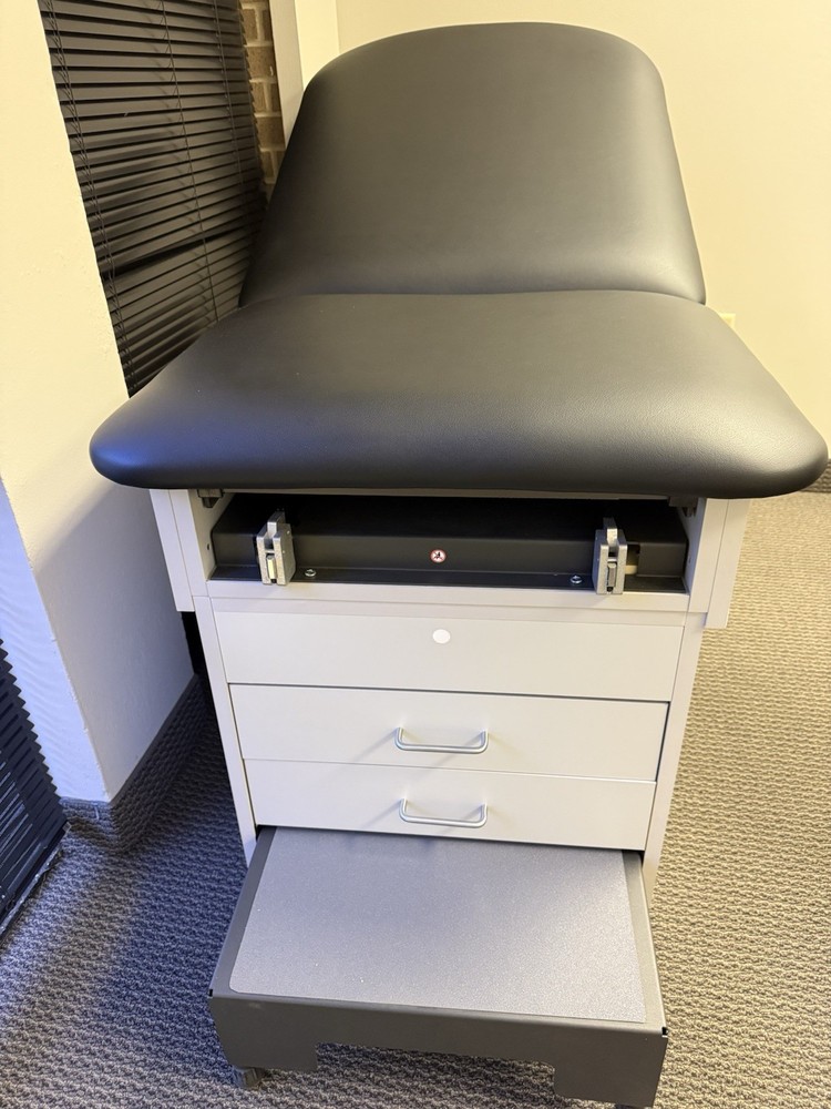 Cabinet Treatment Table w/ Adjustable Back & Pull-out Leg Rest.