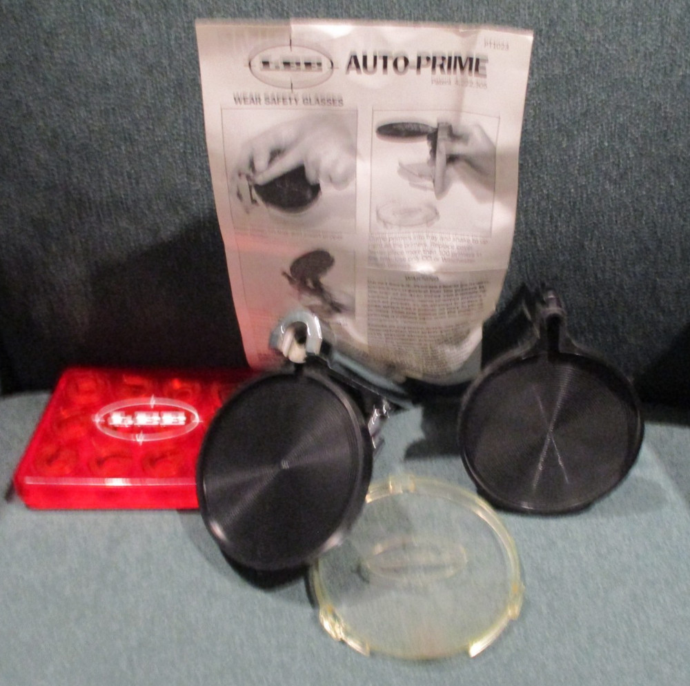 LEE AUTO-PRIME w/ INSTRUCTION SHEET + 12 LEE SHELL HOLDERS IN CASE