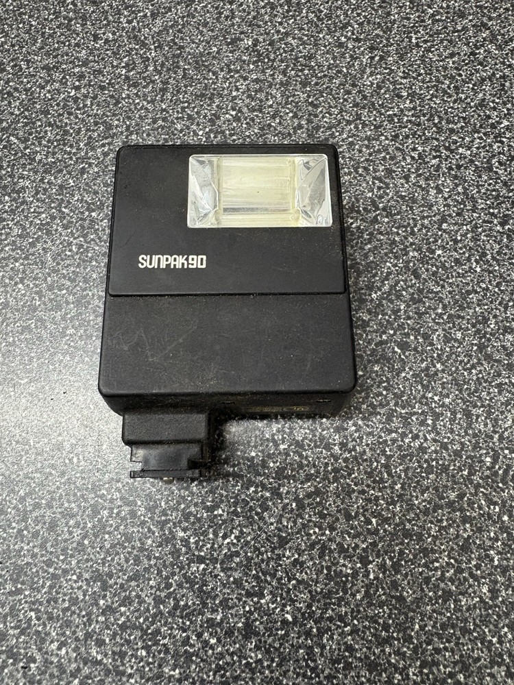 Sunpak 90 Basic Electronic Flash Used On A Canon AE 1 Not Tested