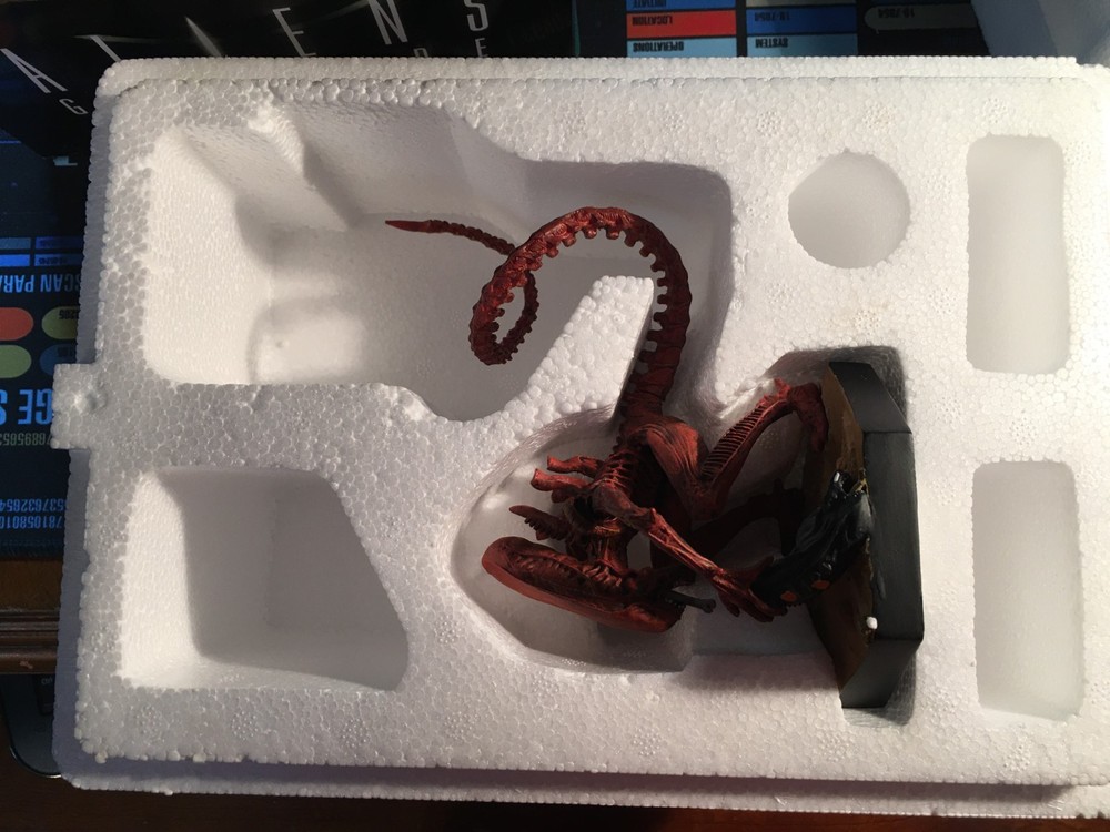 Eaglemoss Aliens #15, "Red Xenomorph" opened, displayed, box, leaflet