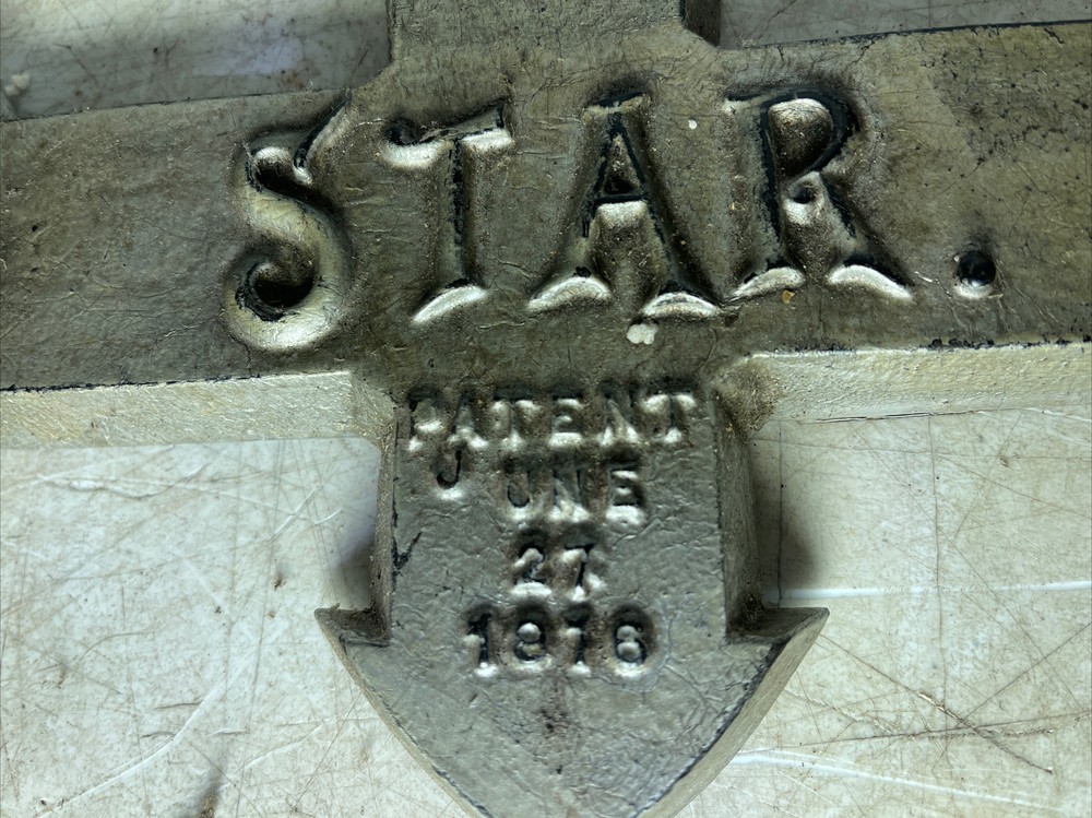 Antique Cast Iron Rotating Star Unknown Tool