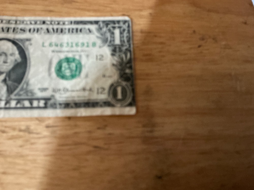 $1 1977 L series "DOUBLE GUTTER FOLD, misaligned errors. RARE