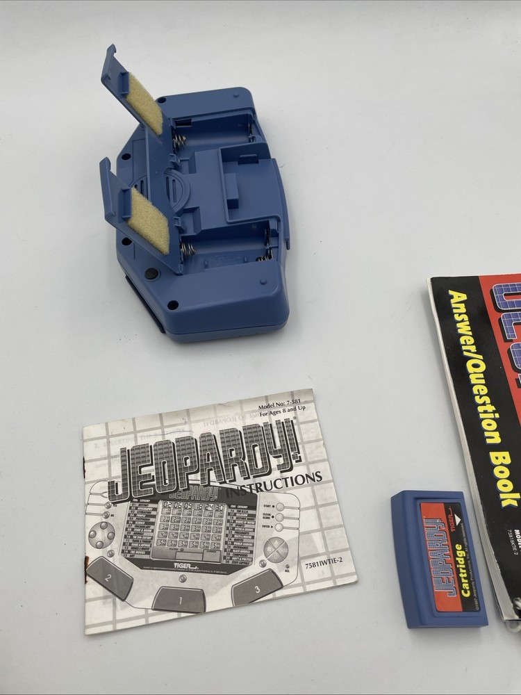 Tiger Electronics Jeopardy Hand Held Game 1995 with Answer Book & Manual E1