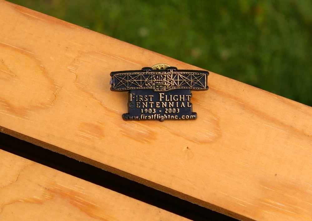 First Flight Centennial 1903-2003 Plastic Biplane Lapel Pin Pinback