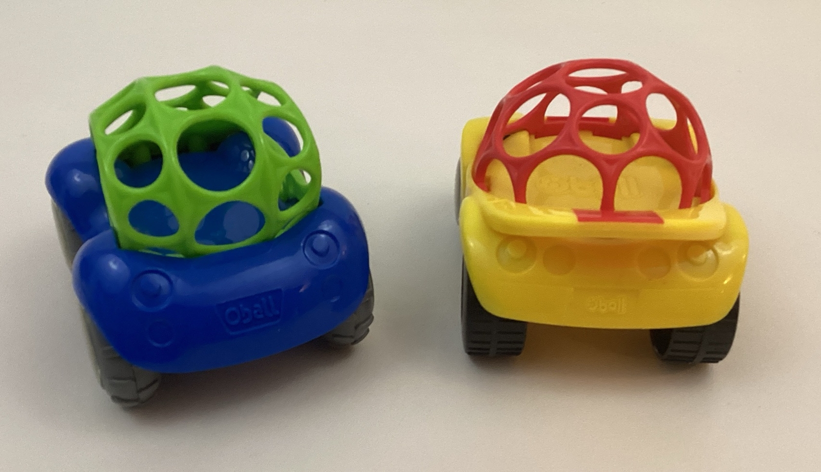 Oball Go Grippers Rattle Roll Race Sports Cars Lot of 2 Yellow Blue Toys