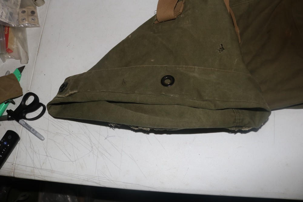 Original late WWII USMC marked transitional colored duffel bag named