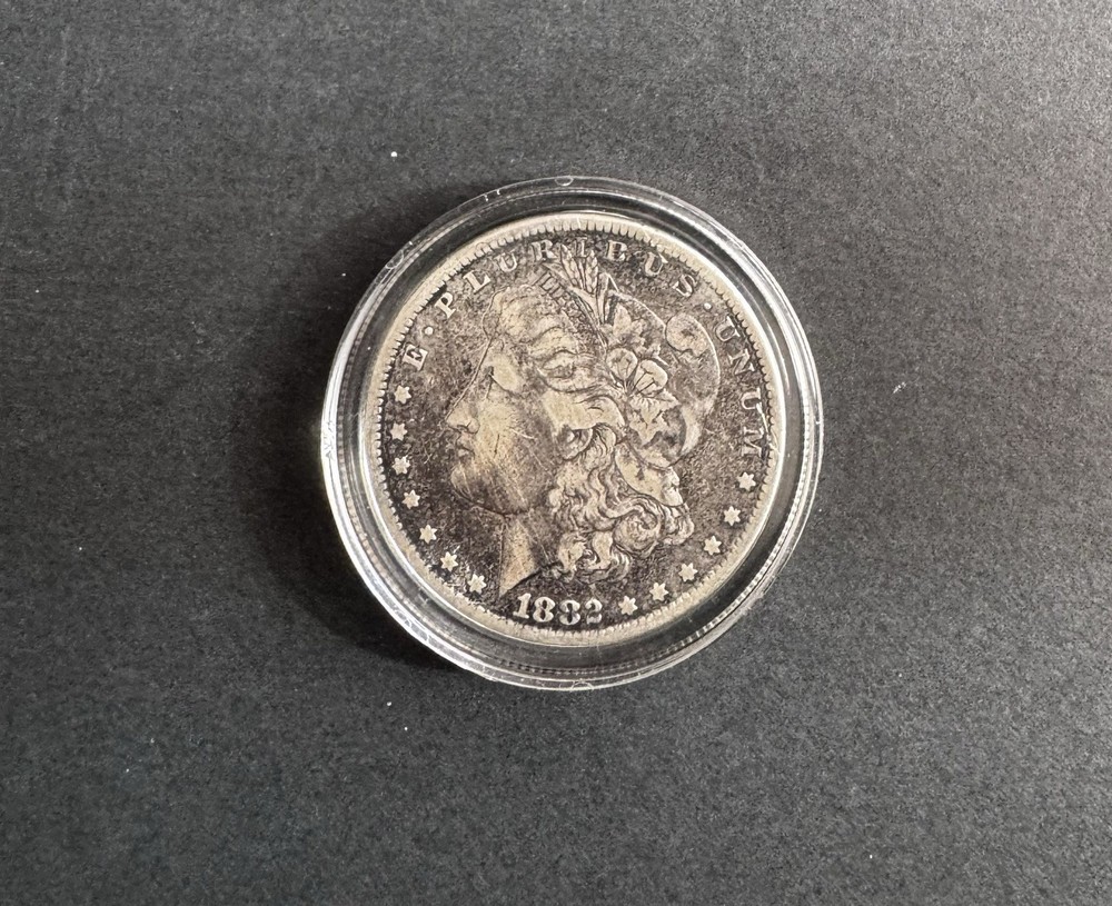 1882 Morgan Silver Dollar – 90% Silver, Encapsulated