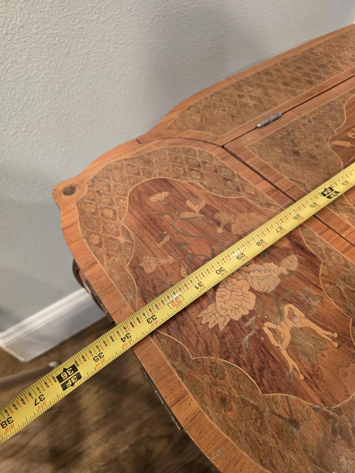"Antique vanity table from the late 1800s with intricate inlay & a hidden mirror
