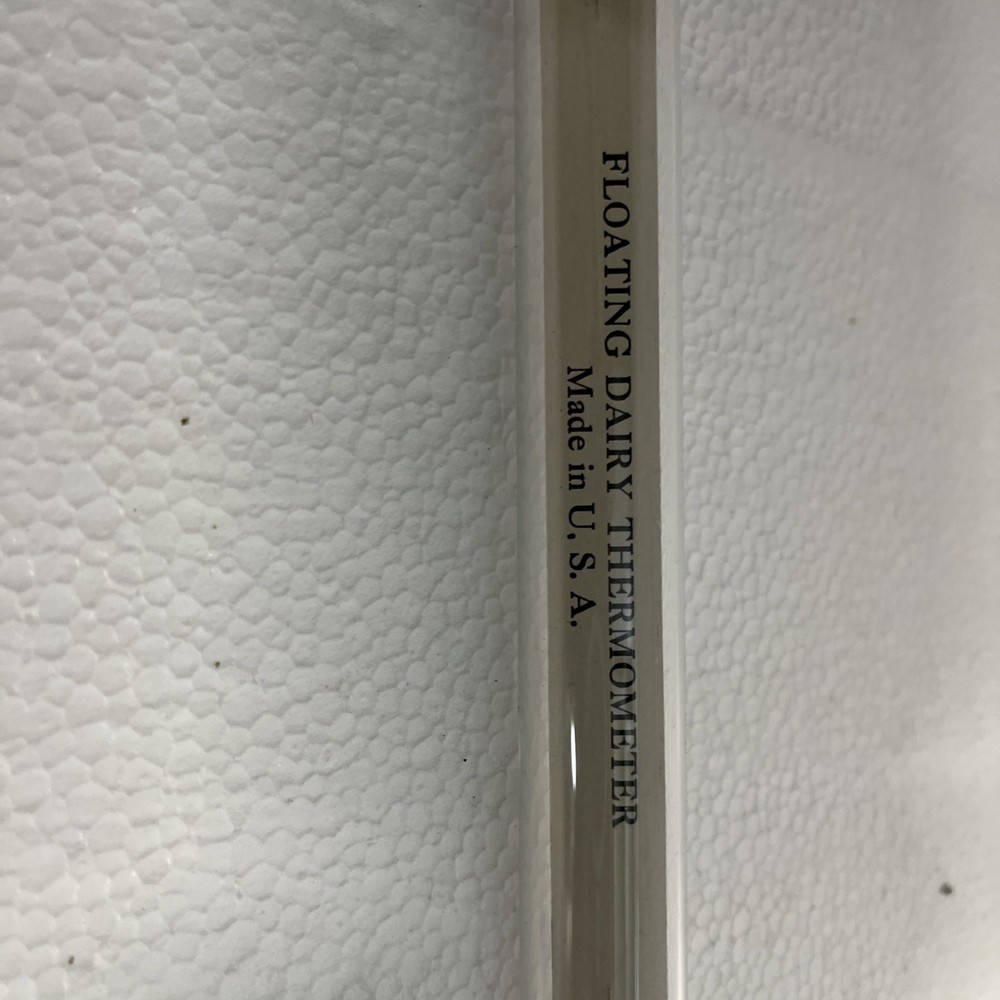 vintage floating dairy thermometer
