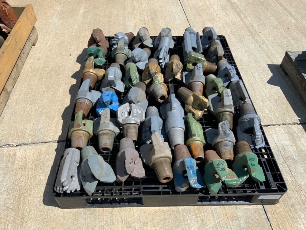 Blade drag bits . Most are new . All sizes