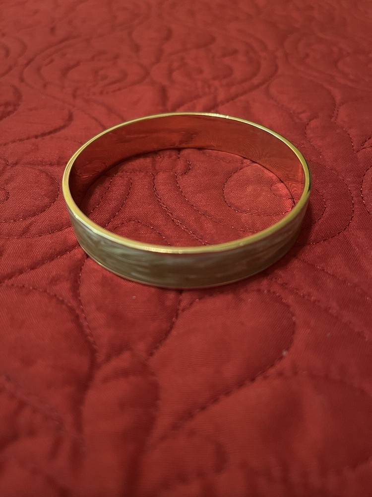 MONET LIGHT GREEN BANGLE BRACELET 2 1/2 DIAMETER.SIGNED.