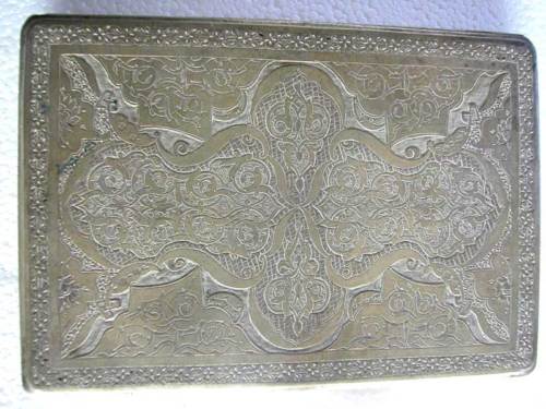 A VINTAGE MIDDLE EASTERN SILVER CIGARETTE CASE
