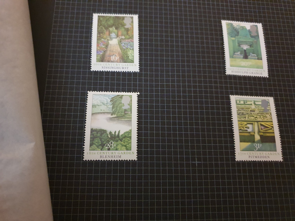 LANCASTER ROSE STAMP ALBUM CONTAINING APPROX 50 MINT GB COMMEMORATIVE SETS #3240