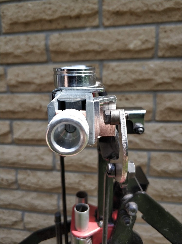 Cam bracket for universal charge bar model D for Mec Progressive